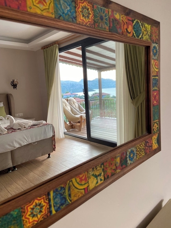 Imagen de la habitación del SUNA HOUSE. Foto 16