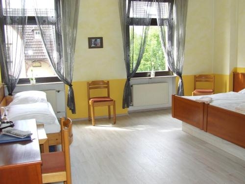 Imagen de la habitación del Saarland Hotel - Restaurant Milano. Foto 10