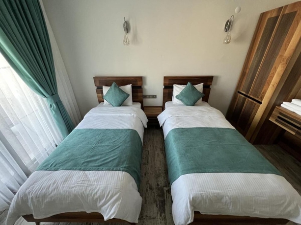 Imagen de la habitación del Sığacık Liman Pansiyon. Foto 3
