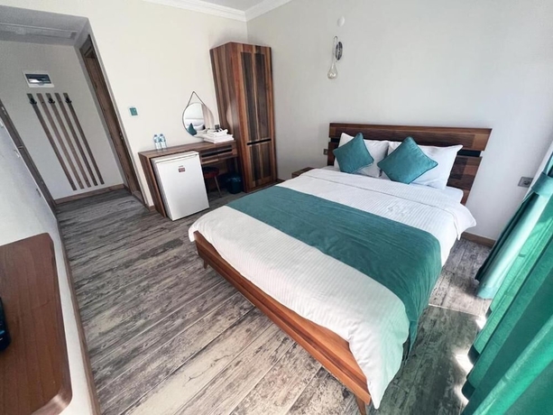Imagen de la habitación del Sığacık Liman Pansiyon. Foto 5