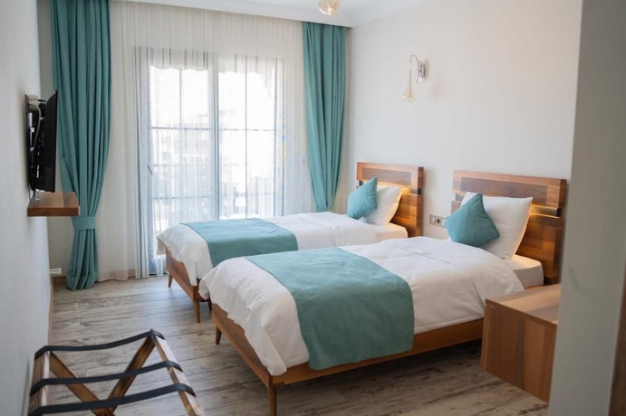 Imagen de la habitación del Sığacık Liman Pansiyon. Foto 7