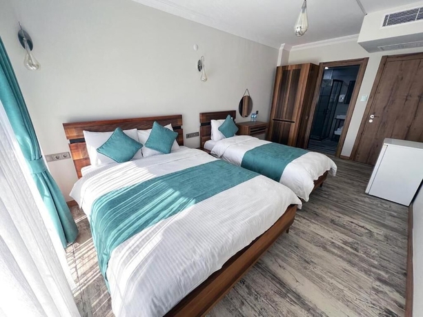 Imagen de la habitación del Sığacık Liman Pansiyon. Foto 8