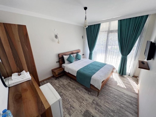 Imagen de la habitación del Sığacık Liman Pansiyon. Foto 10