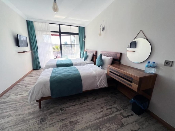 Imagen de la habitación del Sığacık Liman Pansiyon. Foto 14