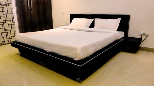 Imagen de la habitación del Sai Village Manesar. Foto 2