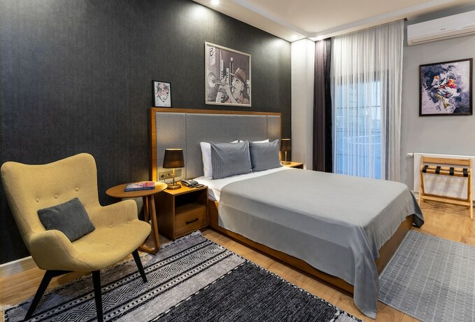 Imagen de la habitación del Sala Suites. Foto 17