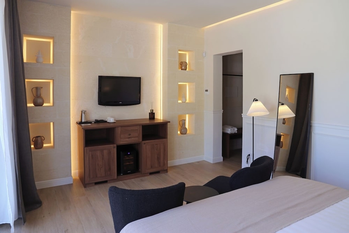 Imagen de la habitación del Salento Winery Lodge. Foto 8