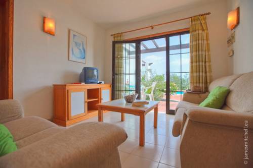 Imagen de la habitación del Salmarina Bungalows. Foto 2