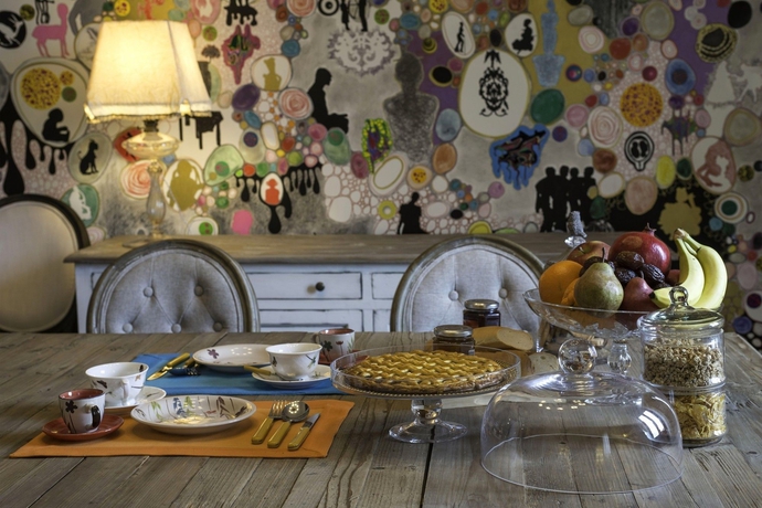 Imagen del bar/restaurante del San Pietro Arte In Suite. Foto 3