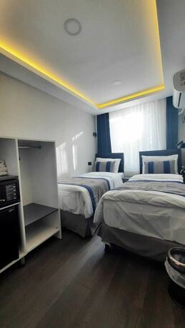 Imagen de la habitación del Sanddoor Hotel. Foto 14