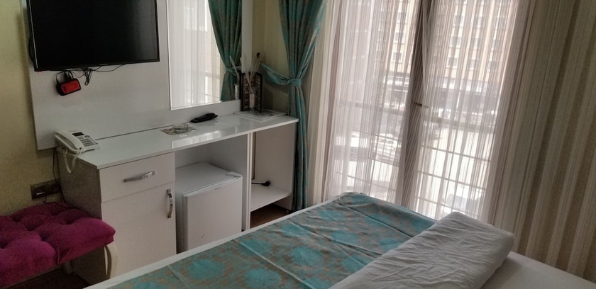 Imagen de la habitación del Sanli Hotel. Foto 15