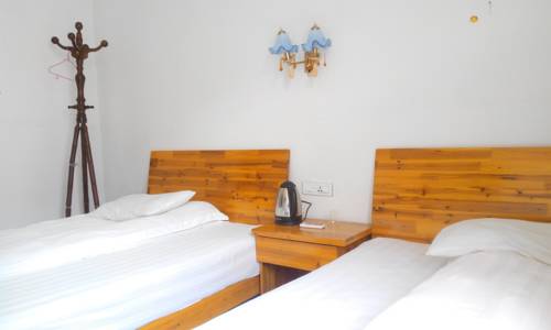 Imagen de la habitación del Sanqingshan Jinyilai Inn. Foto 3