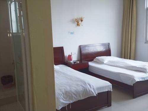 Imagen de la habitación del Sanqingshan Jinyilai Inn. Foto 4