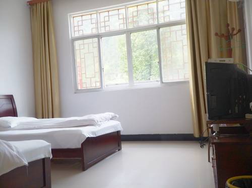 Imagen de la habitación del Sanqingshan Jinyilai Inn. Foto 5