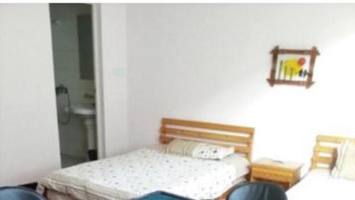 Imagen de la habitación del Sanqingshan Xiangyuan Inn. Foto 4