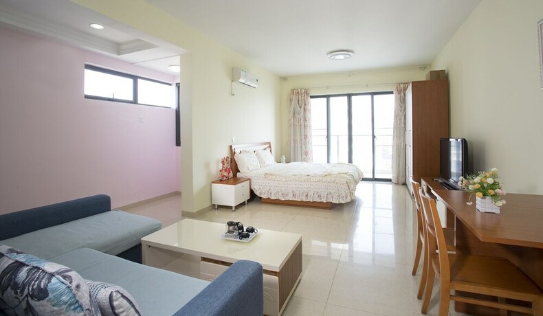 Imagen de la habitación del Sanya Chunting Holiday Apartment. Foto 17