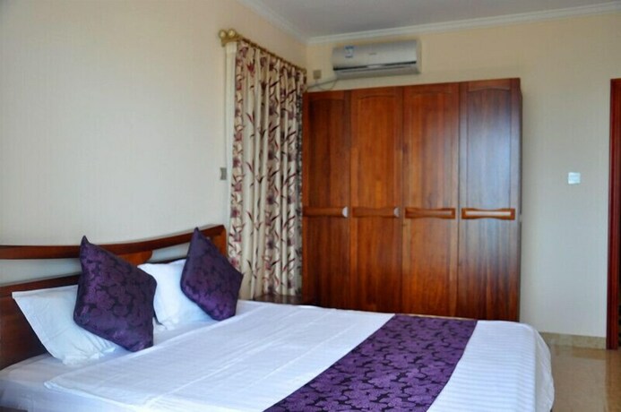 Imagen de la habitación del Sanya Chunting Holiday Apartment. Foto 21