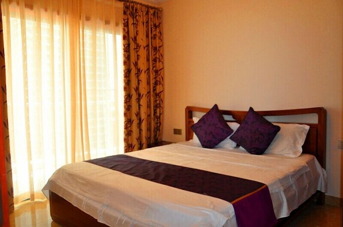 Imagen de la habitación del Sanya Chunting Holiday Apartment. Foto 22