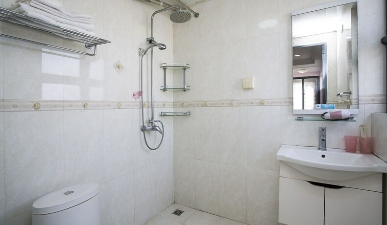 Imagen de la habitación del Sanya Chunting Holiday Apartment. Foto 28