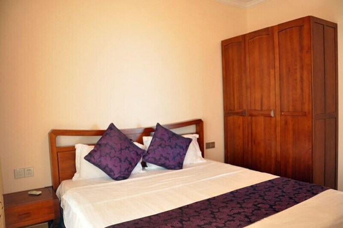Imagen de la habitación del Sanya Chunting Holiday Apartment. Foto 30