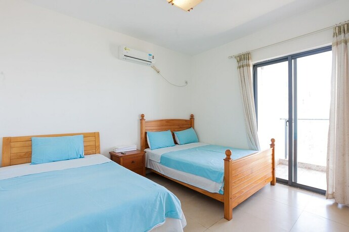 Imagen de la habitación del Sanya Chunting Holiday Apartment. Foto 35