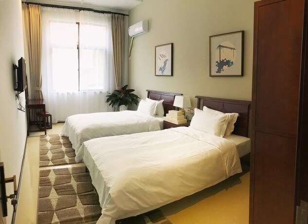 Imagen de la habitación del Sanya Shanggong Rehabilitation Villa. Foto 19