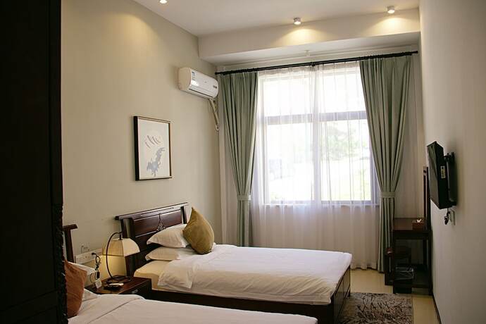 Imagen de la habitación del Sanya Shanggong Rehabilitation Villa. Foto 23