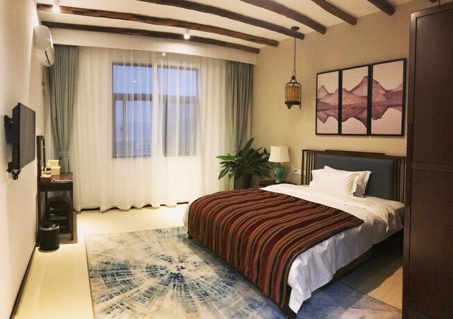 Imagen de la habitación del Sanya Shanggong Rehabilitation Villa. Foto 24