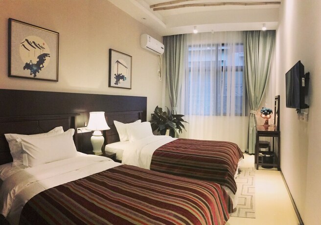 Imagen de la habitación del Sanya Shanggong Rehabilitation Villa. Foto 34
