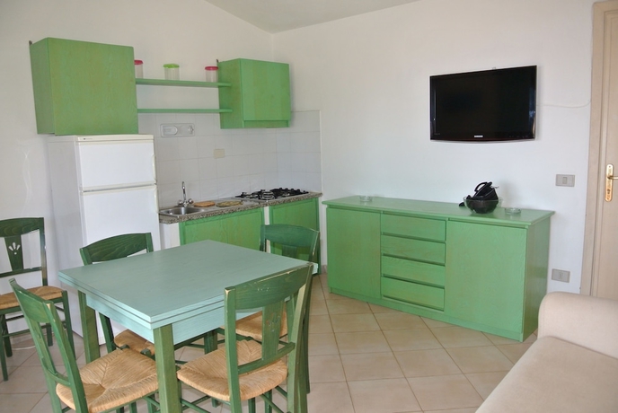 Imagen de la habitación del Sardinia Blu Residence. Foto 3