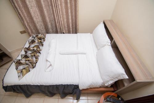 Imagen de la habitación del Saroz gardens & resort. Foto 19