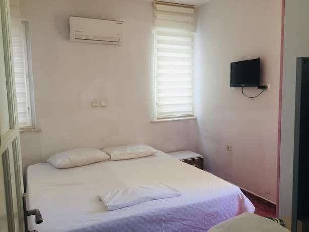 Imagen de la habitación del Sato Apart Hotel Fethiye. Foto 10