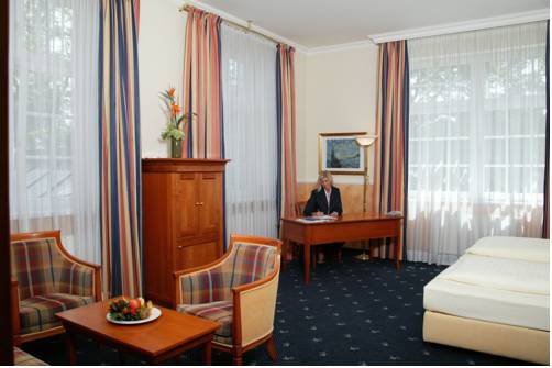 Imagen de la habitación del Schlosshotel Gr&uuml;nwald. Foto 12
