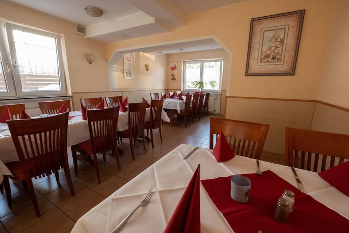 Imagen del bar/restaurante del Schnitzelhaus und Pension Stadt Rosbach. Foto 4