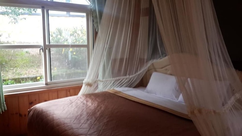 Imagen de la habitación del Sea Of Clouds Vacation Villa. Foto 16