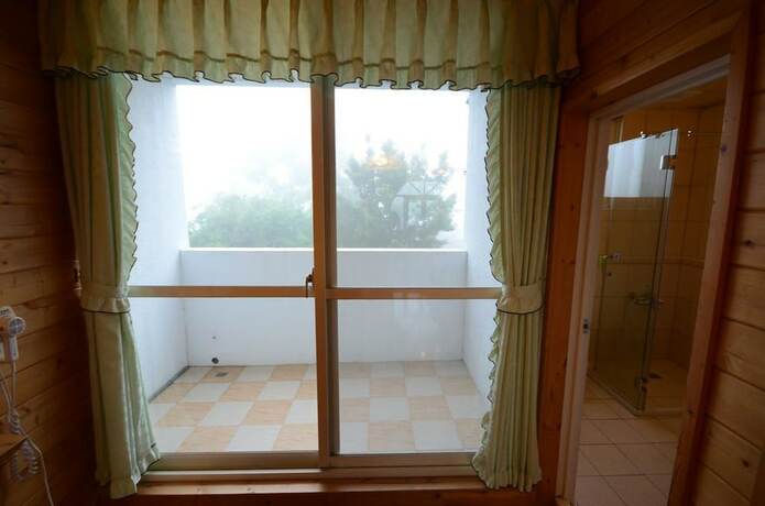 Imagen de la habitación del Sea Of Clouds Vacation Villa. Foto 20