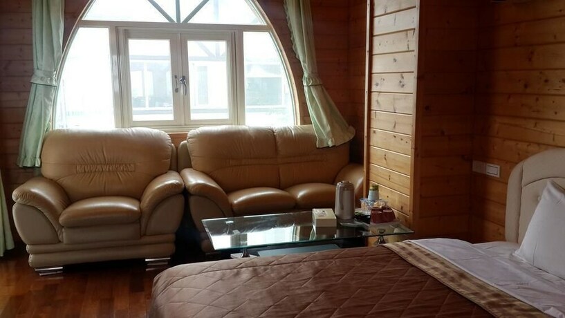 Imagen de la habitación del Sea Of Clouds Vacation Villa. Foto 27