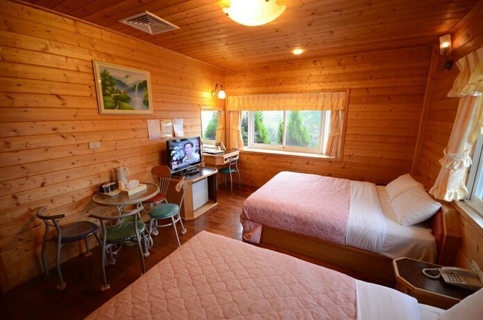 Imagen de la habitación del Sea Of Clouds Vacation Villa. Foto 31