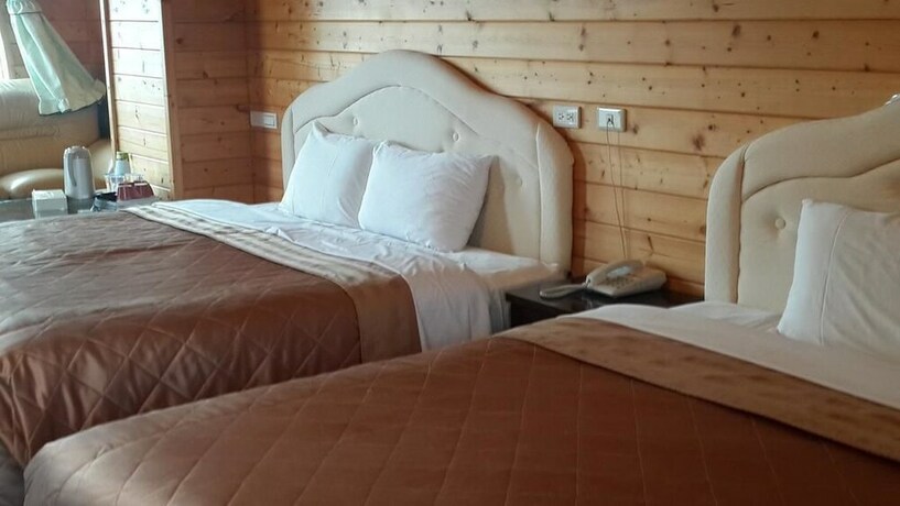 Imagen de la habitación del Sea Of Clouds Vacation Villa. Foto 32