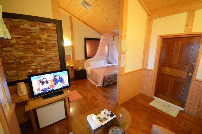 Imagen de la habitación del Sea Of Clouds Vacation Villa. Foto 34