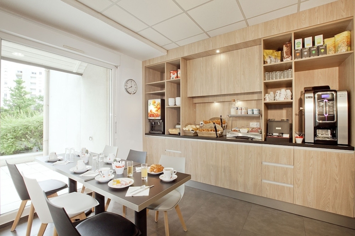 Imagen del bar/restaurante del Séjours and Affaires Grenoble Marie Curie. Foto 5