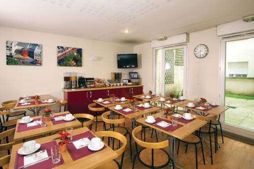 Imagen del bar/restaurante del Séjours and Affaires Pantin Charles De Gaulle. Foto 3