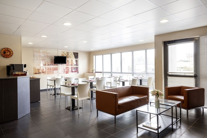 Imagen del bar/restaurante del S&eacute;jours and Affaires Paris Vincennes. Foto 3