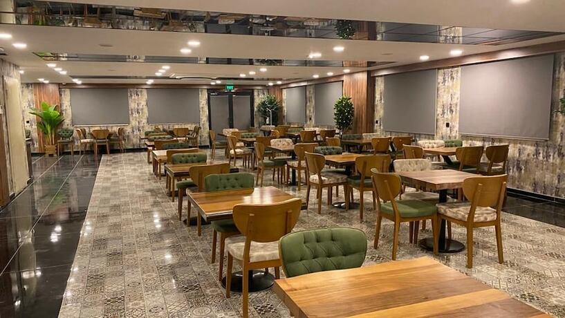 Imagen del bar/restaurante del Seandos Otel. Foto 11