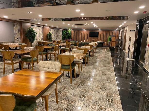 Imagen del bar/restaurante del Seandos Otel. Foto 13