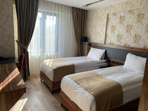 Imagen de la habitación del Seandos Otel. Foto 18