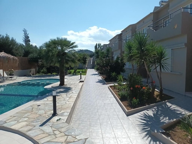 Imagen de la habitación del Secret Garden Hotel, Platanias. Foto 11
