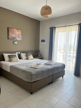 Imagen de la habitación del Secret Garden Hotel, Platanias. Foto 12