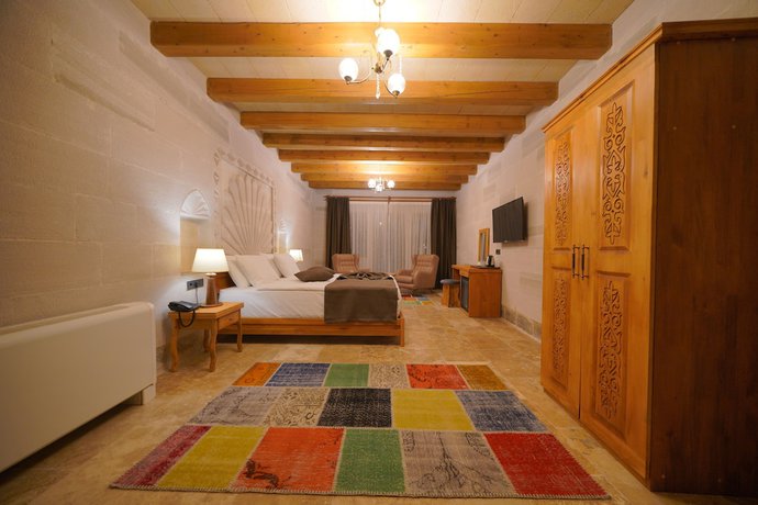 Imagen de la habitación del Secret Hill Cave Suites. Foto 11