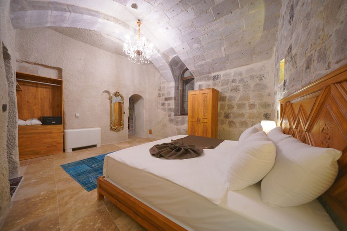 Imagen de la habitación del Secret Hill Cave Suites. Foto 16